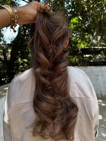 This is what a 'Beige Color Refresh' looks like. We took her faded, brassy hair and transformed it into this soft, beautiful beige blonde with a healthy shine.