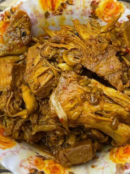 A bowl of my unique Kathal (Jackfruit) pickle. This is a seasonal speciality, made from tender raw jackfruit and a blend of traditional spices that give it a distinct, meaty texture and savoury taste.