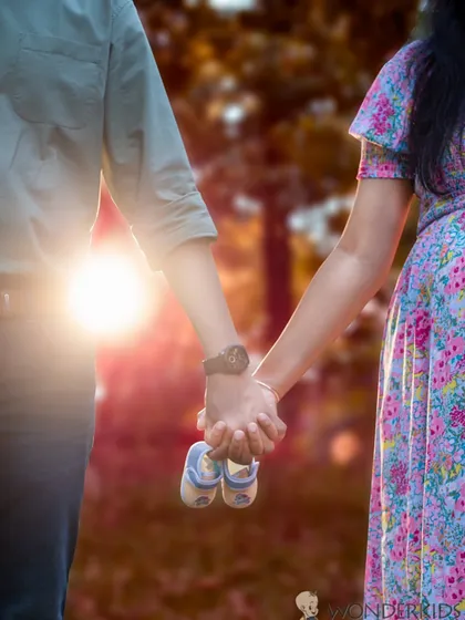Sometimes the smallest details tell the biggest story. A simple prop like a pair of baby shoes held between an expecting couple adds a layer of sweet anticipation to your maternity photoshoot.