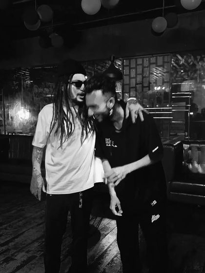 Sharing a laugh with a fellow artist. It's not just about the music; it's about the connections you make.