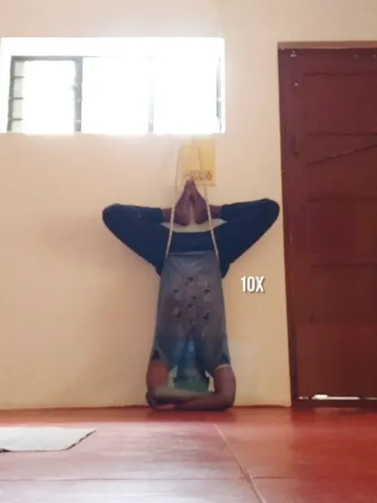 Using props like a simple strap and a wall, we can safely explore inversions. This technique takes gravitational pressure off the spine, providing relief for back pain and demonstrating how we can adapt yoga for therapeutic benefits.