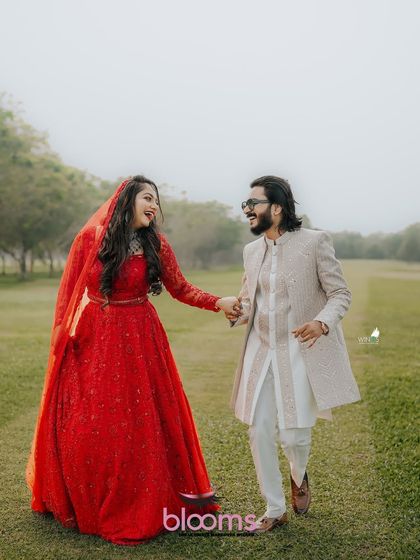Another look from the couple's outdoor photoshoot, showcasing the complete, coordinated wedding attire.