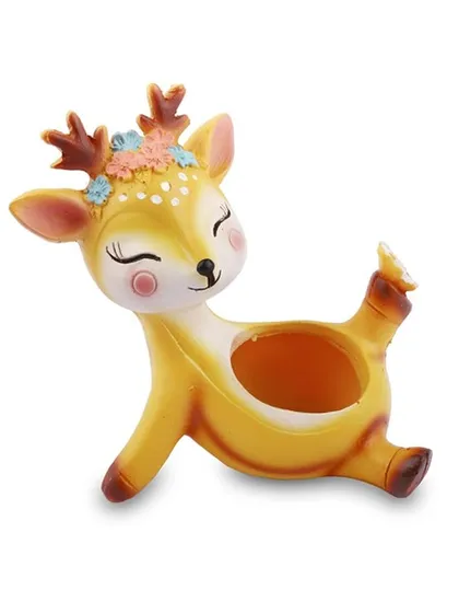 A close-up of the cheerful deer pot, showing the detailed craftsmanship. Made from high-quality resin, it's a durable and delightful home for your mini plants.