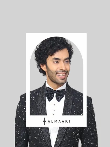 A men's sequined tuxedo jacket that's made for the spotlight. Paired with a classic white shirt and bow tie, this look is perfect for a New Year's Eve party, a cocktail event, or a performance.