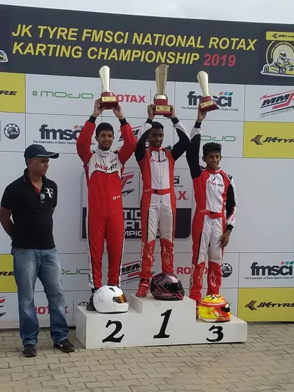 Our Junior category drivers celebrating a 1-2-3 finish, a recurring result that highlights the effectiveness of our training program.