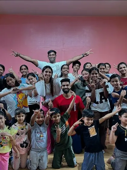 It's not just for adults! I love sharing the joy of movement with the next generation. This is a group shot from one of my fun and energetic dance workshops for kids and teens.