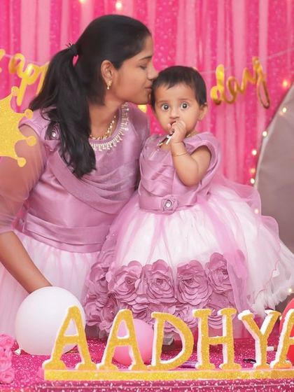 A magical 'Unicorn' themed birthday party, with pastel colors, shimmering backdrops, and unicorn illustrations, creating a whimsical and dreamy atmosphere.