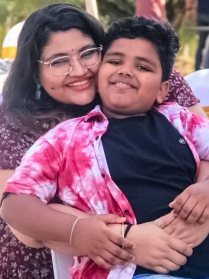 A mother and son share a hug at our Doctors' Day event. It was a day for these hardworking professionals to relax and connect with their families on the farm.