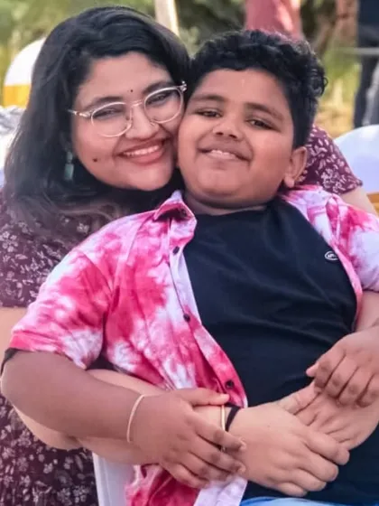 A mother and son share a hug at our Doctors' Day event. It was a day for these hardworking professionals to relax and connect with their families on the farm.