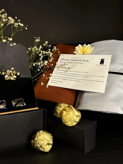 Our gift sets are a celebration of luxury and indulgence. This one includes fabric for a shirt and trouser, cufflinks, and some sweet treats to make it extra special.