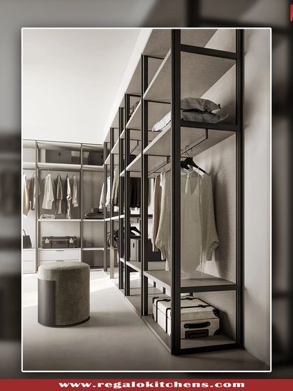 An open-concept walk-in closet design that feels spacious and accessible. We used a minimalist frame structure to provide ample storage without visually closing off the room.