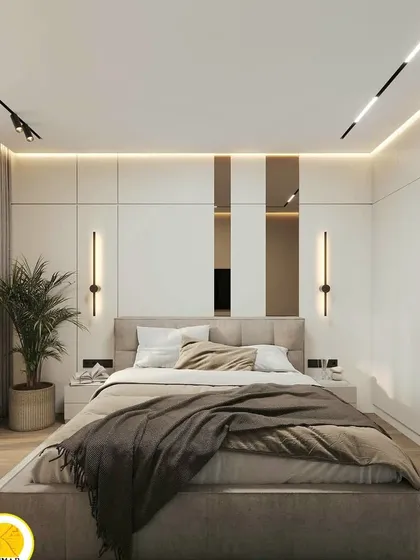 This perspective highlights the seamless integration of the wardrobe and the bed's feature wall.