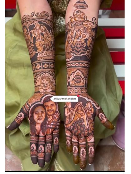 This design combines a realistic couple portrait on one palm with a traditional wedding scene on the other, and includes divine figures like Radha-Krishna and Ganesha.