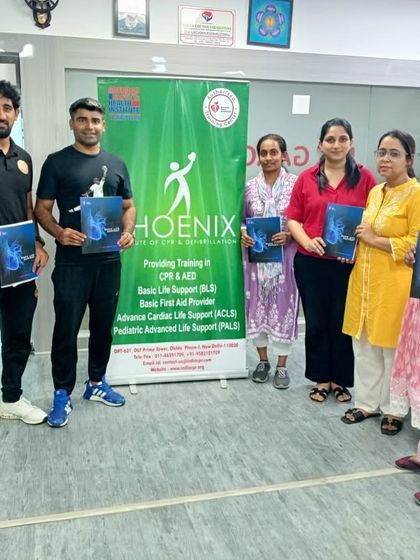 Proudly holding my completion materials with fellow participants after successfully finishing the CPR and AED program at the Phoenix institute. Continuous learning is a key part of my professional commitment.