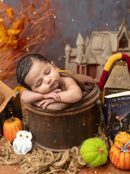 The perfect 'chin-on-hands' pose in our Harry Potter setup. This little wizard is fast asleep, dreaming of magical adventures.