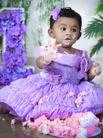 Nothing says "Happy First Birthday" like a cake smash! We love capturing the pure, messy joy as your little one dives into their first cake. This session is all about fun, laughter, and creating delightfully candid memories.