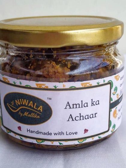 A freshly sealed jar of my Amla ka Achaar. This tangy and juicy gooseberry pickle is a favourite for its unique taste and health benefits. It's a great way to add some goodness to your plate.