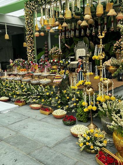 A side view showing the extensive floral arrangements for the yellow bell-themed event.