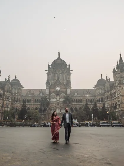 There's a certain magic to an empty Mumbai street at dawn. We started early to capture the grandeur of the CST station, creating a timeless portrait for this city-loving couple.