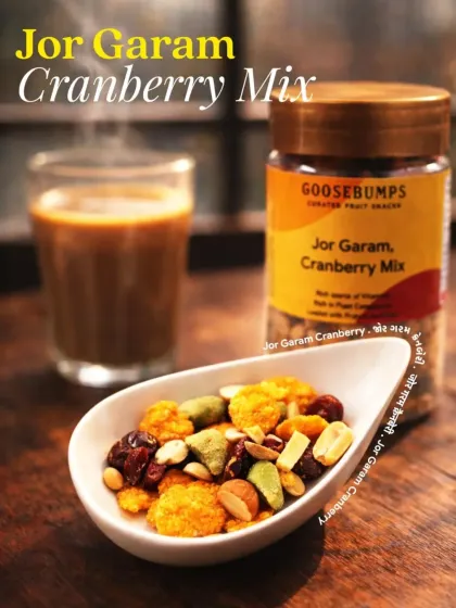 My Jor Garam Cranberry Mix is a delightful trail mix with a blend of textures and flavours. It combines the sweetness of cranberries with the savoury crunch of nuts and puffed rice, making it a satisfying snack for any time of day.