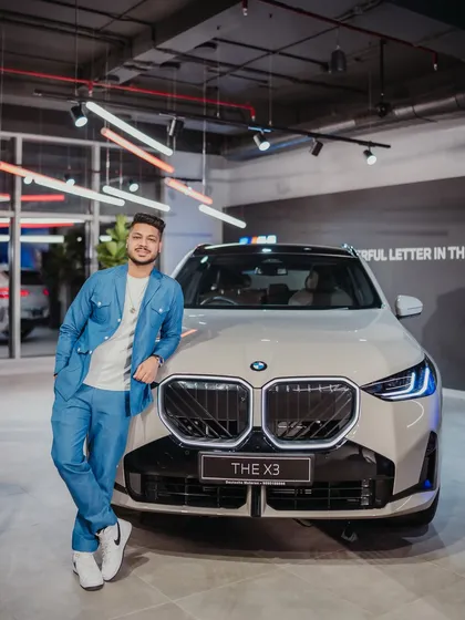 Posing with the new BMW X3 after performing at their grand store opening in Safdarjung. I specialize in creating high-energy, sophisticated entertainment that aligns perfectly with luxury brand launches and corporate events.