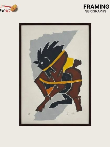 An M.F. Husain serigraph, known for its bold lines and dynamic energy. The frame we selected is clean and modern, ensuring the focus remains entirely on the master's iconic bull figure.