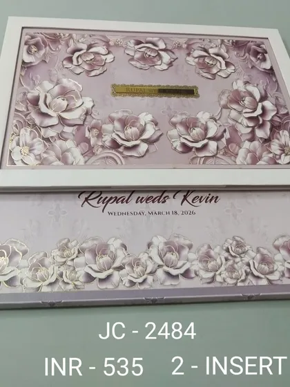 This premium invitation features a beautiful frame filled with three-dimensional lavender roses, giving it a soft and romantic feel. The gold nameplate in the center can be customized with your initials for a personal touch.
