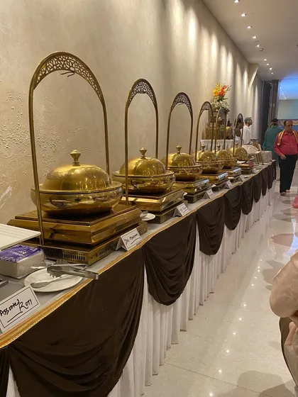 An elegant buffet arrangement for a Mata ki Chowki in Powai. We use beautiful brass serving dishes to add a touch of tradition and class to religious and social gatherings.