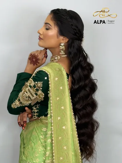A side profile showing the soft makeup and the elegant flow of the hair.