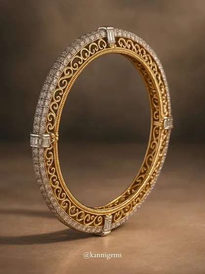 A detailed look at the craftsmanship of this filigree and diamond bangle. The swirling gold patterns are a testament to the skill of my artisans.