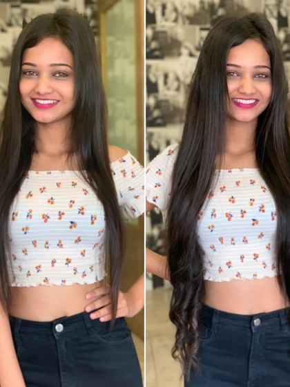 The same client, showing the versatility of her new extensions. Here they are styled with beautiful, bouncy curls.