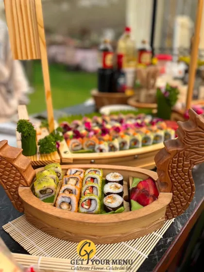 An elaborate sushi boat display, showcasing a wide variety of rolls, from maki to uramaki, beautifully arranged and ready to be devoured.