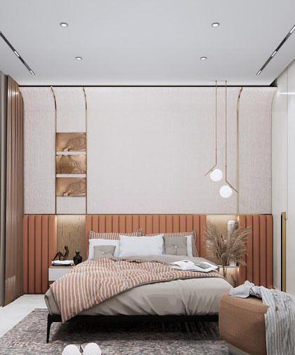 Another view of the minimalist bedroom, highlighting the clean lines of the white wardrobes and the warm, inviting color palette of the bedding and headboard.