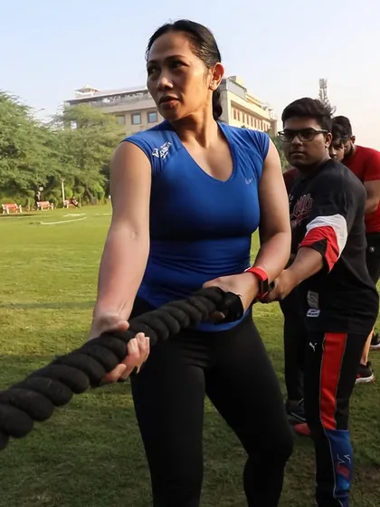 We love taking fitness outdoors. Here, our members engage in a friendly but fierce tug-of-war during one of our outdoor bootcamps, showing the teamwork and raw strength that these sessions build.
