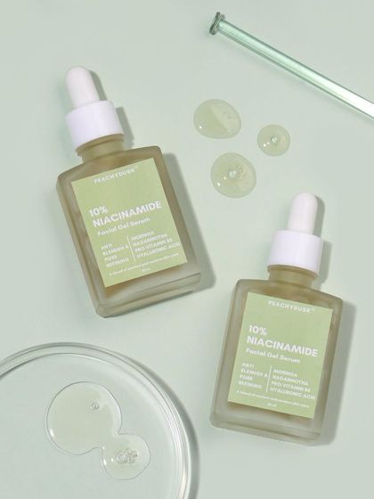 This flat-lay shot showcases the clean, natural aesthetic of my 10% Niacinamide Serum, a powerhouse blend of traditional herbs and modern science for radiant skin.