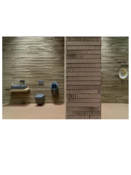 The design cleverly uses the raw, layered edges of the cardboard to create a unique and tactile wall surface.