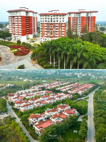 An expansive aerial view of Zuari Garden City in Mysuru, capturing both high-rise apartments and a large villa community. This demonstrates our expertise in showcasing large-scale residential real estate projects.