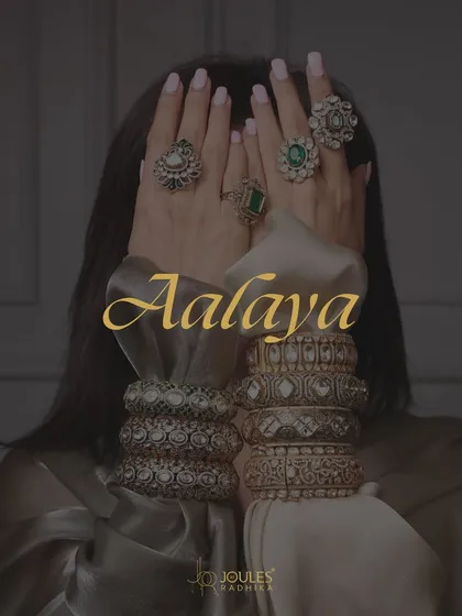 Unveiling Aalayaa. This image captures the essence of the collection, where temple artistry is given a modern edge with an oxidized finish, seen here in stacked kadas and rings.