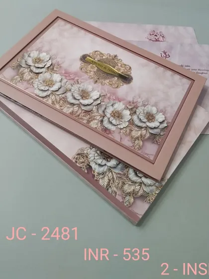 A beautiful framed invitation with 3D flowers in dusty rose and gold. The soft, romantic design and premium finish make it a perfect choice for an elegant wedding.