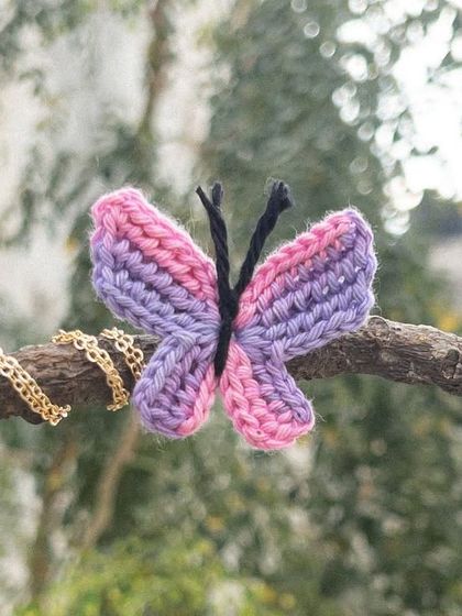 The 'Titli' necklace in a vibrant pink and purple combination. I love how the colors play together in this one.