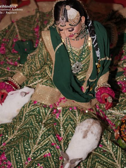 An overhead shot displaying the grandeur of the lehenga and the detailed hair and makeup work.