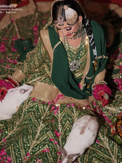 An overhead shot displaying the grandeur of the lehenga and the detailed hair and makeup work.