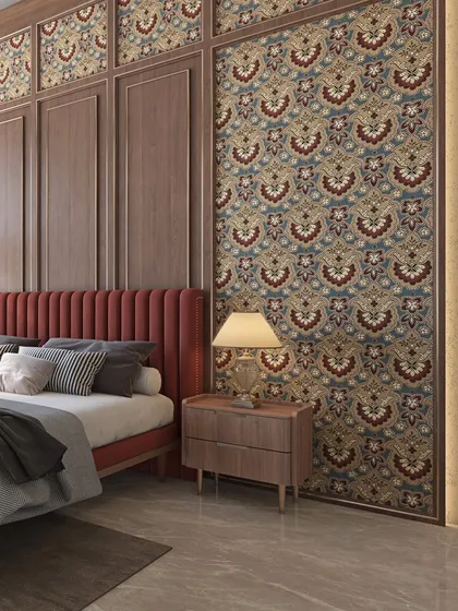 For the grandparents' bedroom in an Aligarh residence, we used traditional Indian patterns and warm wood to create a comforting and familiar atmosphere. The rich red headboard adds a touch of regal color.