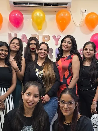 Another group of happy faces from our academy's celebration. Building a strong, supportive community is at the core of what we do.