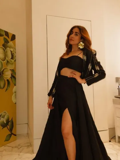The incredible Jonita Gandhi owning the stage and the look in my Metallic Black Floral Statement Earrings. These are designed to be super lightweight so you can feel like a star all night long.