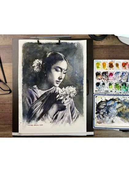 The Nutan portrait on the easel, next to the palette, showing the simple set of colors used to create the monochrome effect.