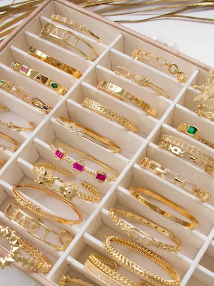 My arm candy collection. This box is filled with some of my best-selling bangles, from emerald loops to studded cuffs.
