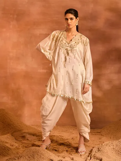 A full-length view of the Orion Kaftan Set, showing how the sumptuous silhouette and intricate details come together for an unforgettable look.