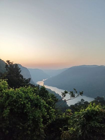 A serene view of the Sharavathi River from a viewpoint on our Gokarna trip.