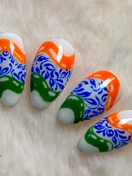 My tribute to the Indian flag, the Tiranga. This design combines the saffron, white, and green with an intricate blue floral pattern representing the Ashoka Chakra.